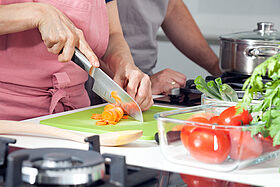 694966172 Cooking lesson,group, hands close-up