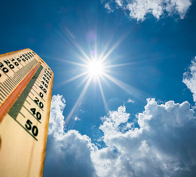 Thermometer Sun high Degres. Hot summer day. High Summer temperatures